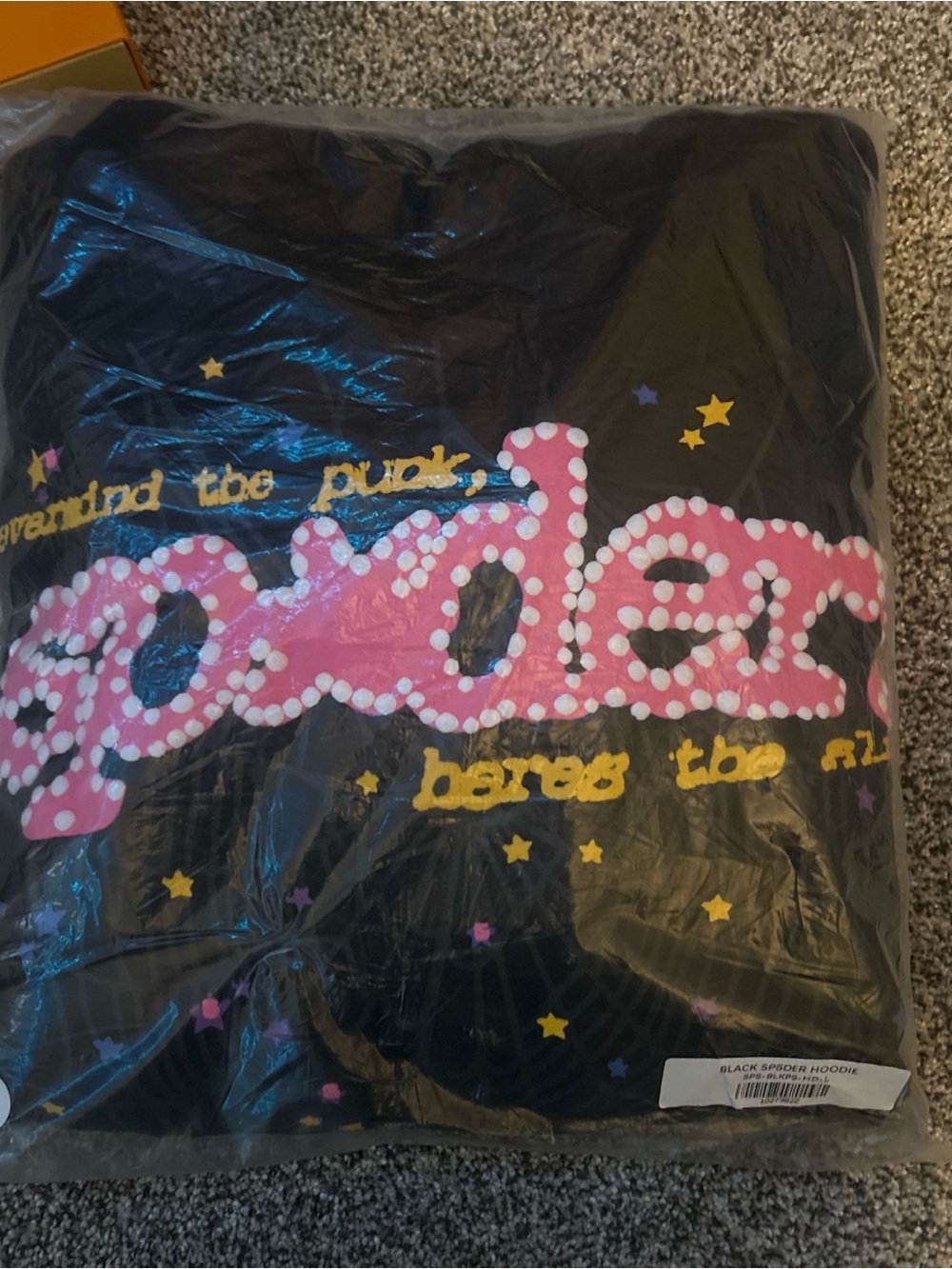 Black Graphic Hoodie with Pink Logo and Yellow Stars